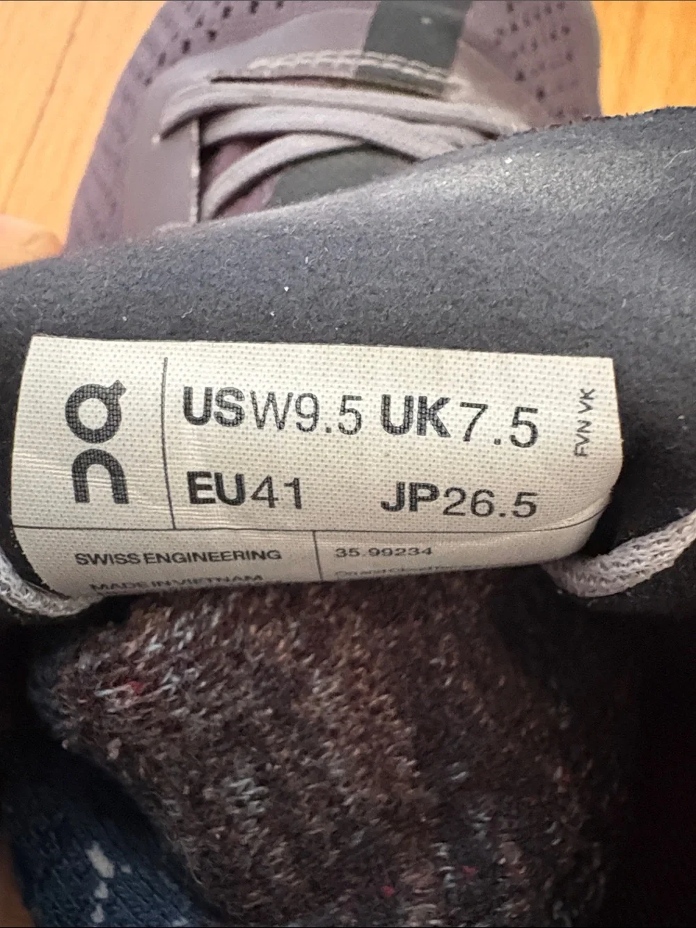 On Running women’s sneakers in Dark Gray and Black